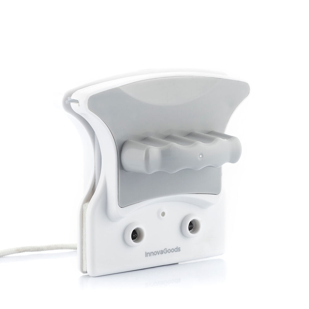 A clean product shot of the Magnetic Window Cleaner in white and gray with the InnovaGoods logo on the front. Highlights the ergonomic handle and dual magnetic pieces.
