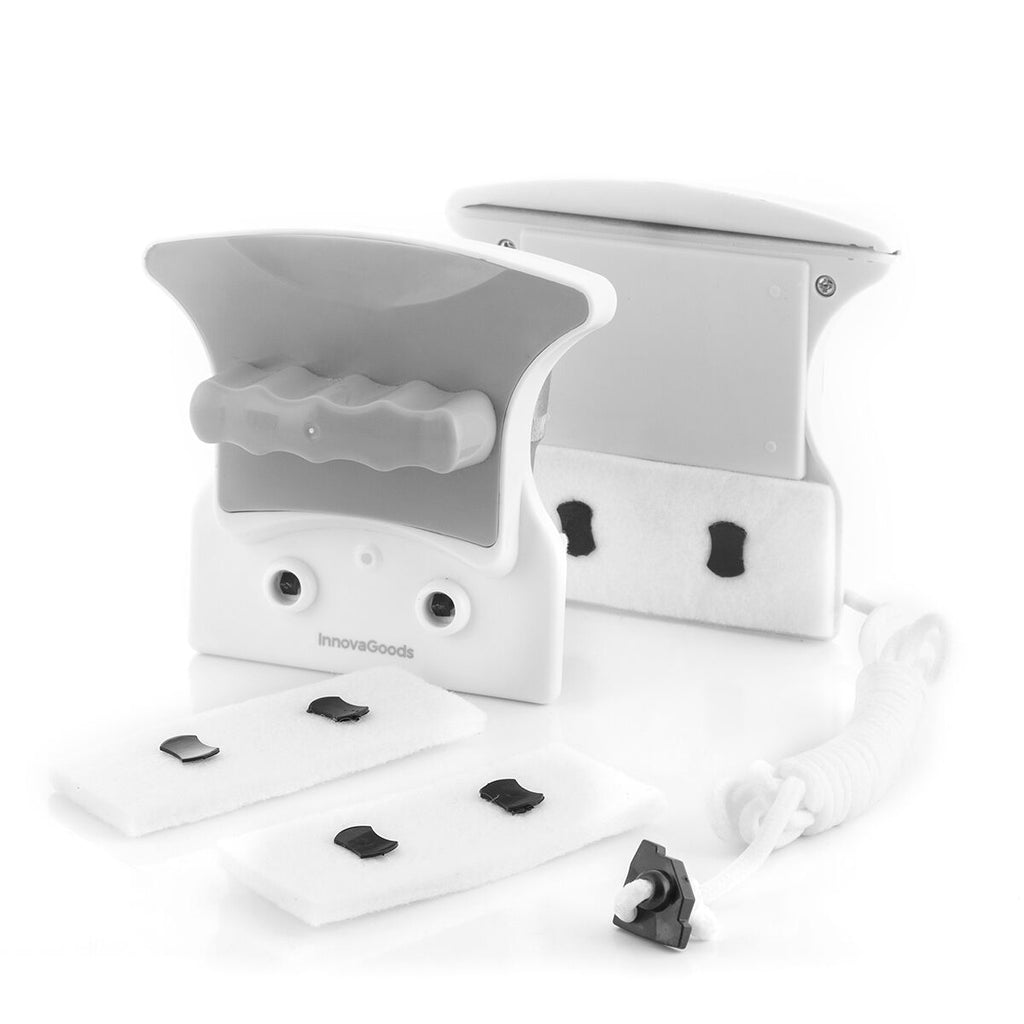 The Magnetic Window Cleaner set displayed with two parts, cushions, and a safety string. Shown in a clean setting with the components separated to highlight their features.