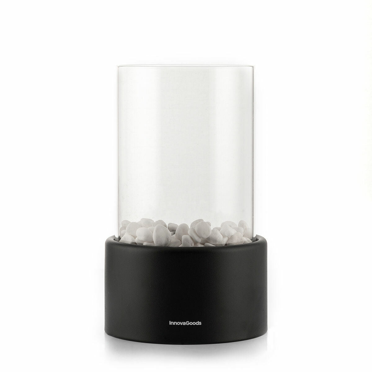Product hero shot of the tabletop fireplace. It features the glass cylinder with white stones and a black base, without the flame.