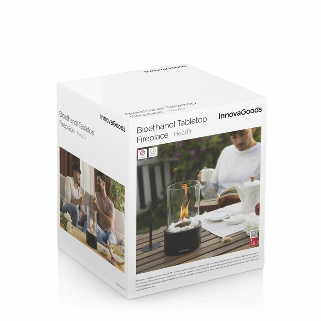 Product packaging showing the Decorative Bioethanol Tabletop Fireplace with lifestyle images on a white box. The box features the product name and InnovaGoods branding.