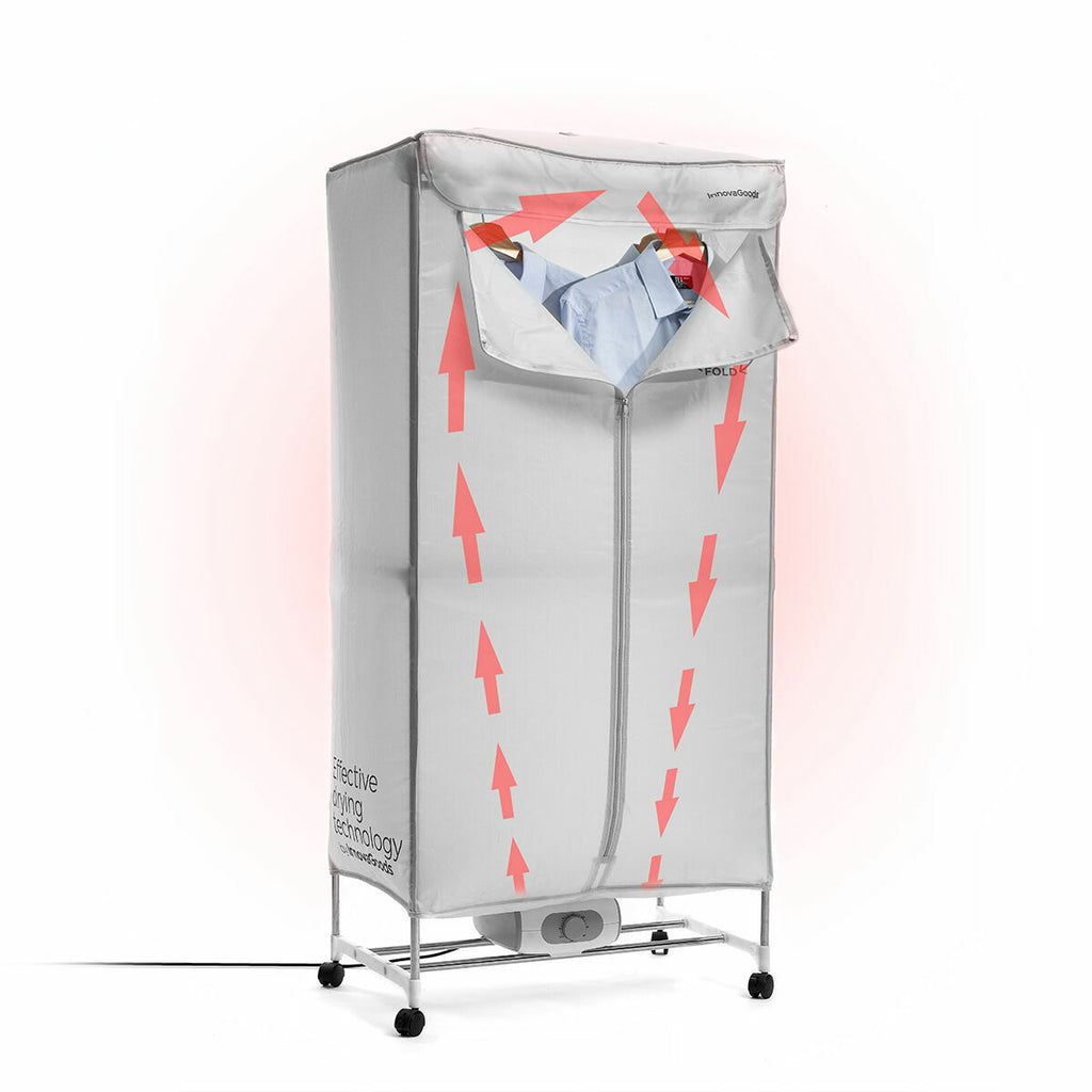 The dryer with its silver cover, arrows illustrating air flow red on the fabric, hanging shirts inside visible through the opening.