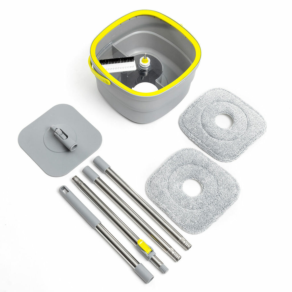 Components laid out including a grey separation bucket, mop handle parts, and mop pads, indicating ease of assembly.