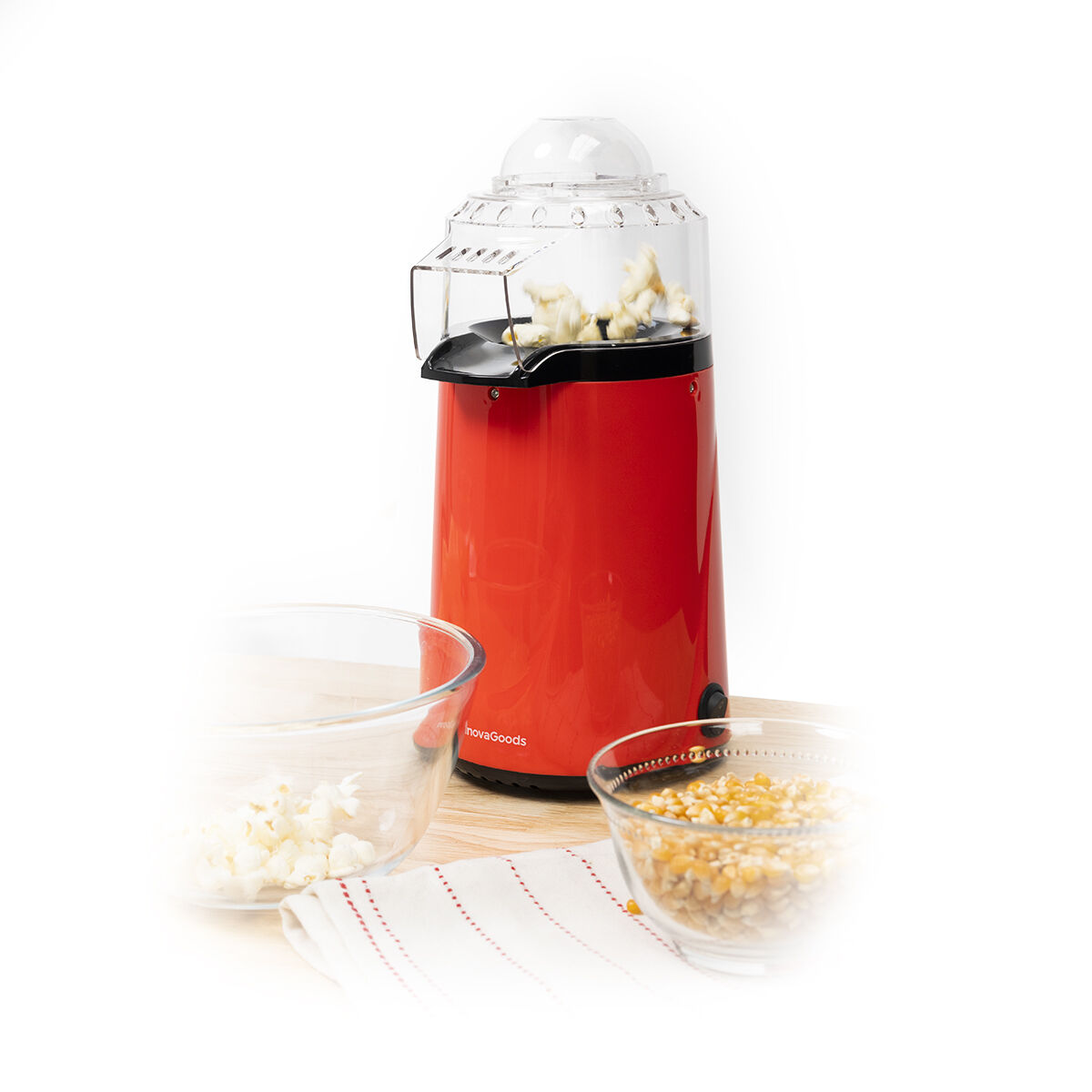 A clean product shot of the Hot Air Popcorn Maker Popmar InnovaGoods with popcorn bowls on a wooden surface.