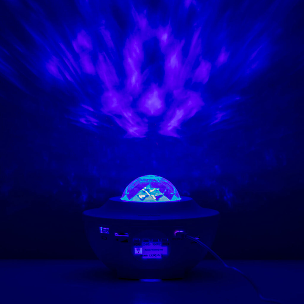 The projector shows a vivid blue and violet projection, emphasizing the variety of light patterns achievable with the device.