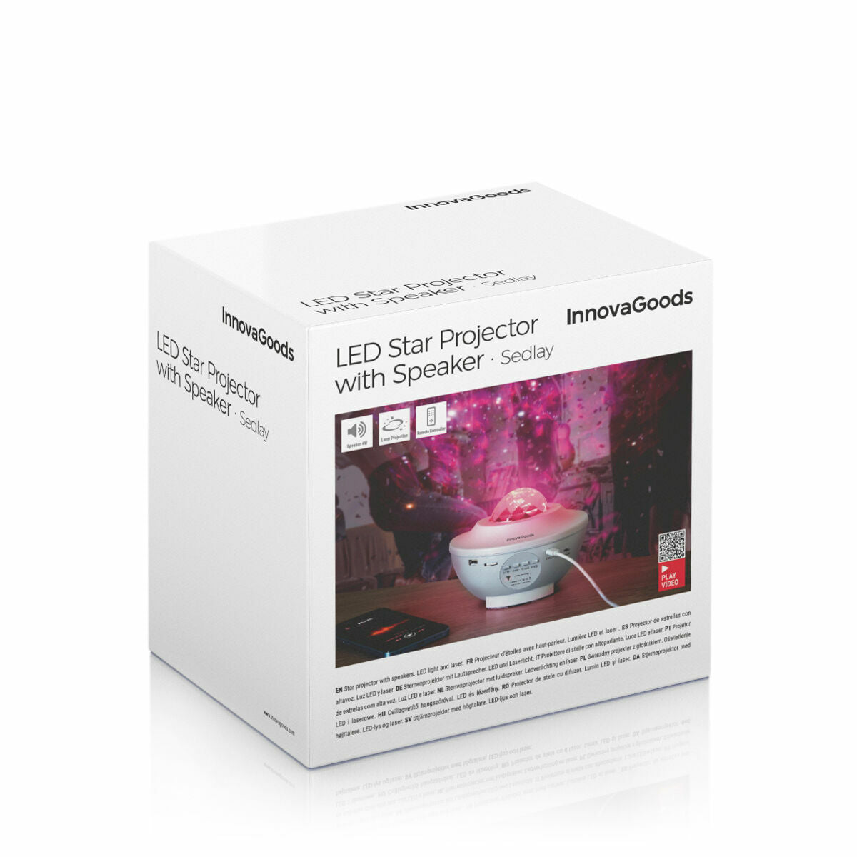 The product packaging is shown, featuring the LED Star Projector with Speaker Sedlay from InnovaGoods. The box is predominantly white, with product visuals and descriptions printed on one side.