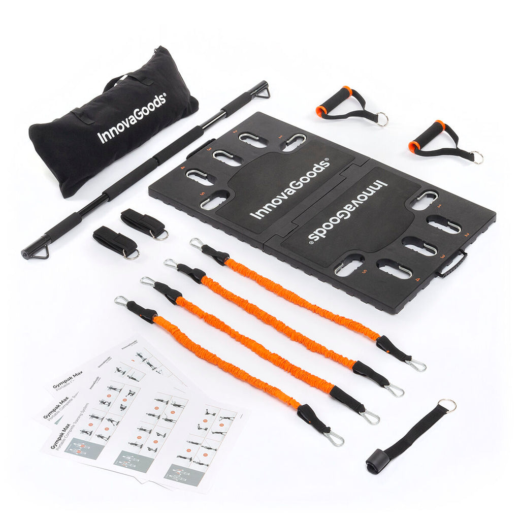 Components of the Gympak Max laid out, including the black exercise board, orange bands, resistance bar, handles, and instructional guides. Branding is visible on the black storage bag.