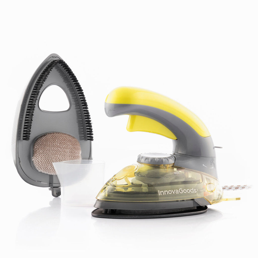 A Mini Vertical and Horizontal 2-in-1 Steam Iron Velyron InnovaGoods 800 W identified by its yellow and gray color scheme. The iron has a transparent body with a visible Innovagoods logo. Includes a water measuring cup and attachments for steam use.