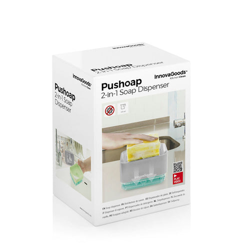 Image of the packaging for the InnovaGoods Pushoap 2-in-1 Soap Dispenser. The box is primarily white with images and details about the product. The product name and brand are clearly displayed.