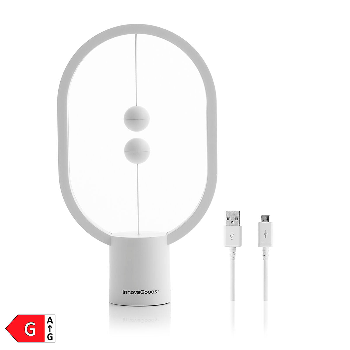 Product hero image of the InnovaGoods Balance Lamp with Magnetic Switch. Shows the lamp against a plain white background, highlighting its oval shape and magnetic spheres. Includes a USB cable, indicating its power source.