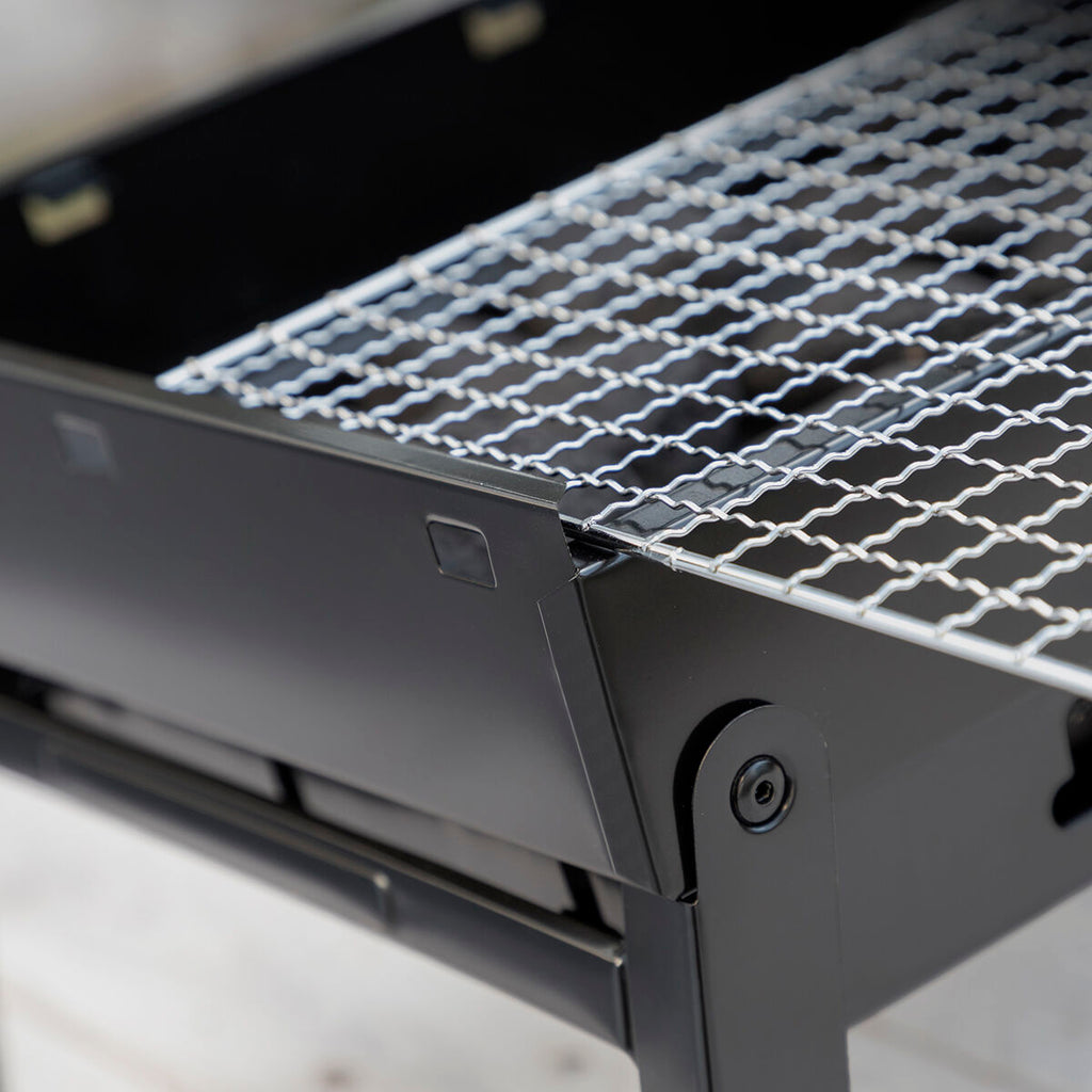 A close-up image focusing on the grill mesh and edge design, showcasing quality and detail.