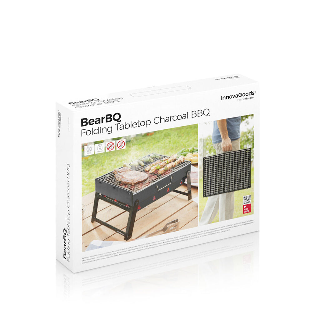 The white packaging box displays the BearBQ Folding Tabletop Charcoal BBQ with images of the product in use. Branding and portability are emphasized on the box.