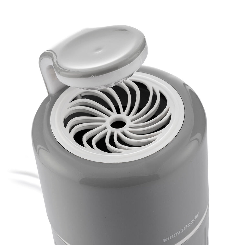A close-up detail image showing the top design of the mosquito lamp, highlighting the fan and the curvature of the top surface. The white inner components are visible, focusing on the detailed craftsmanship.