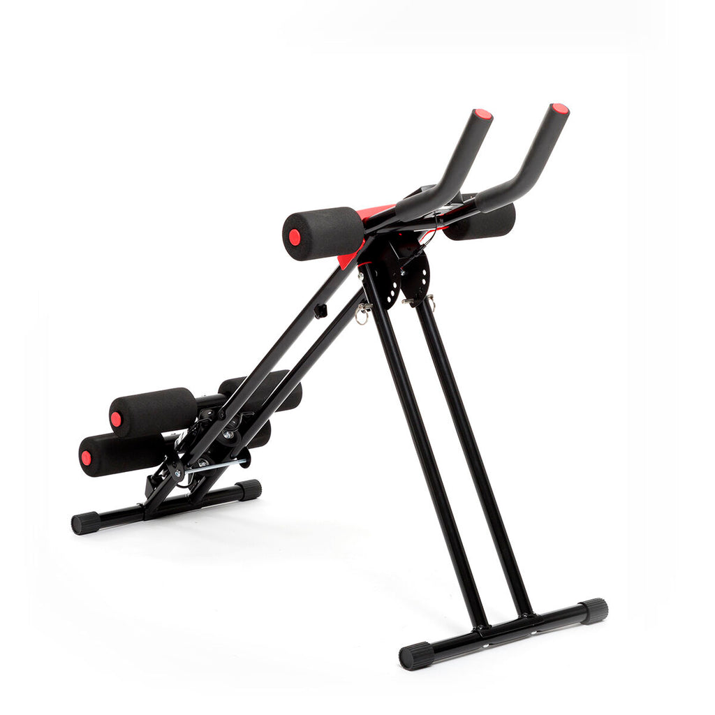 A clean shot of the Folding Abdominal Machine, showcasing its design. The machine is open and ready for use, made primarily of black metal with red details and foam padding.