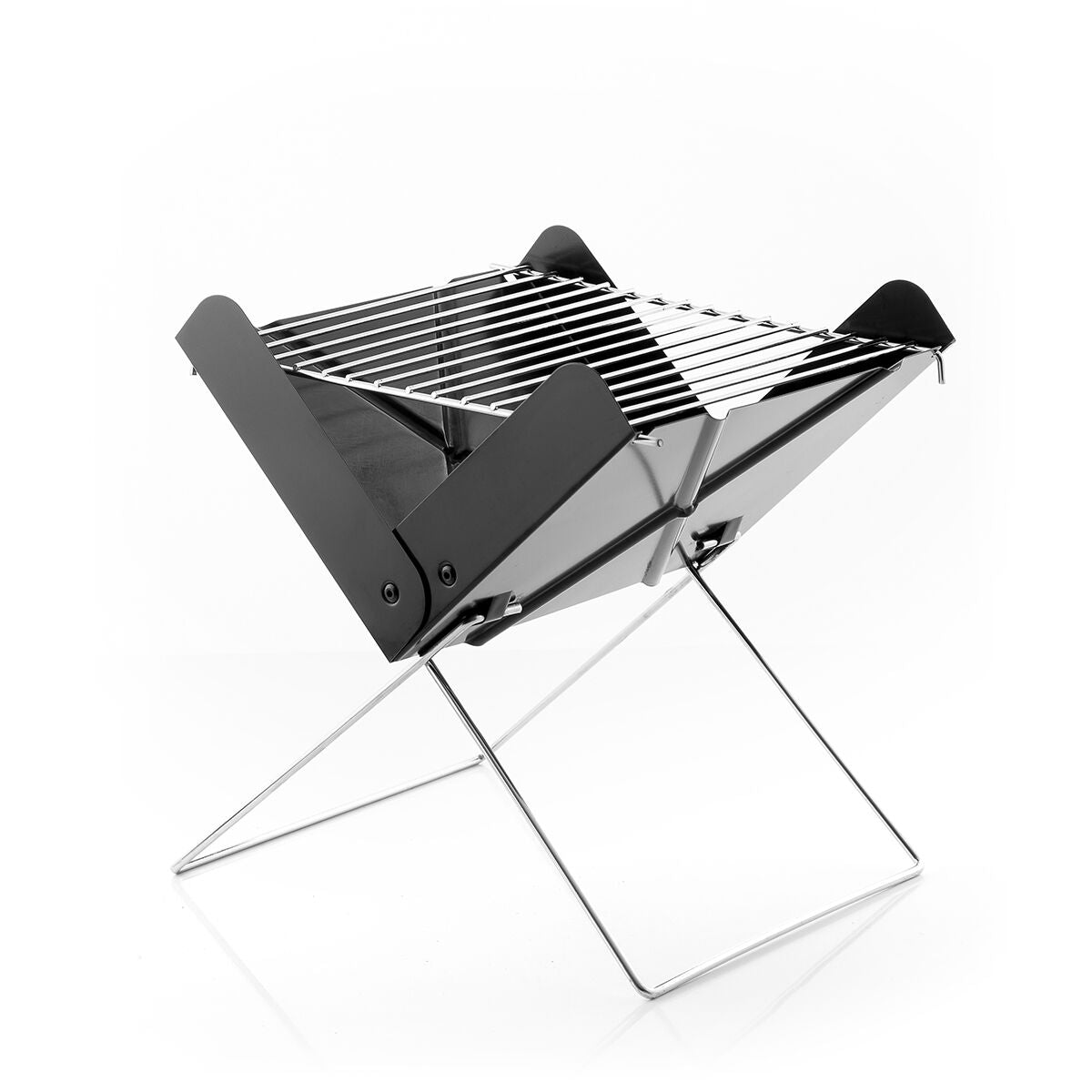 Product image showing the Mini Folding Portable Barbecue set up and ready to use. The grill is placed on a white background, highlighting its sleek black design and metallic grill grates supported by foldable legs.
