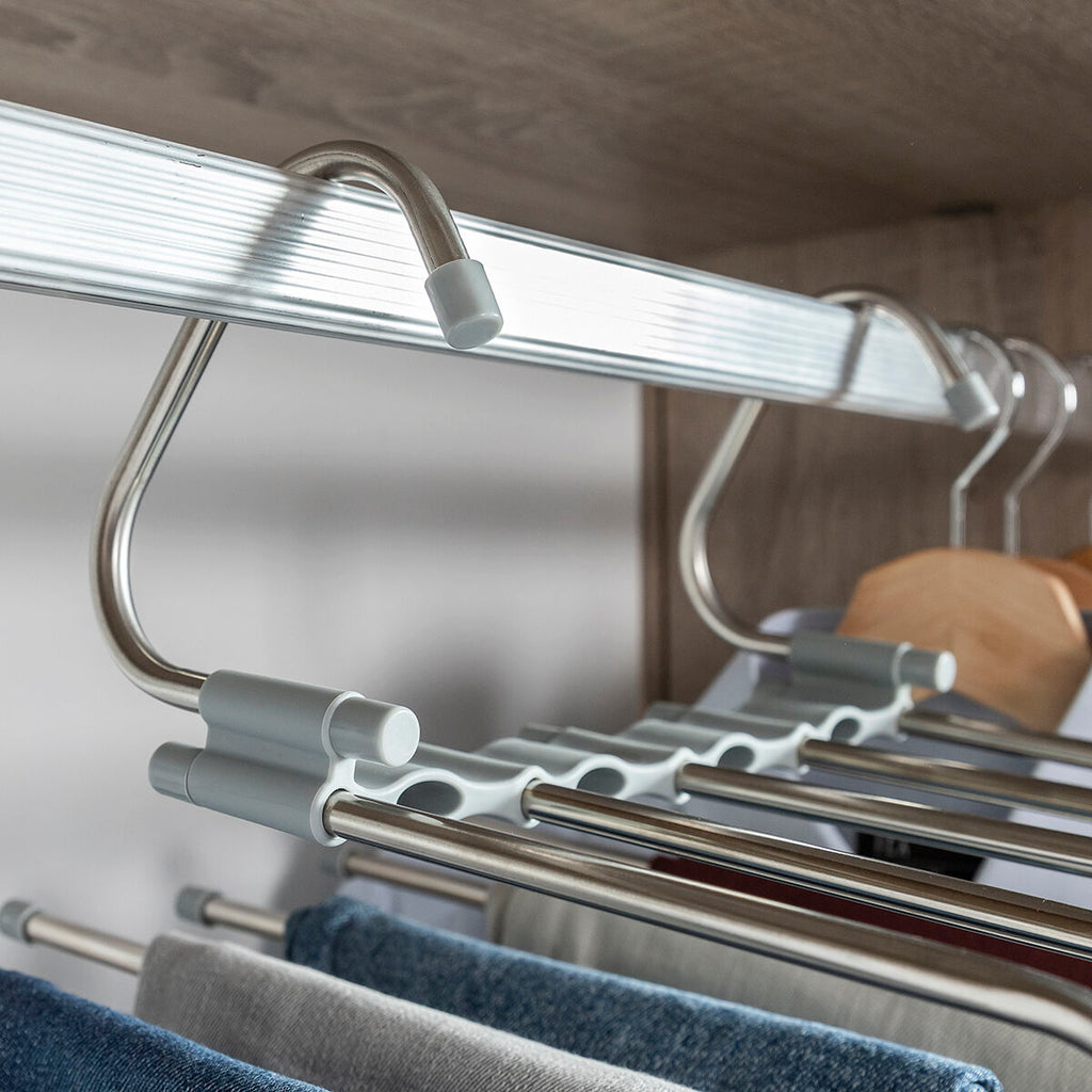 Detailed view of the hanger in a closet with focus on hooks and bars, emphasizing the design and functionality.