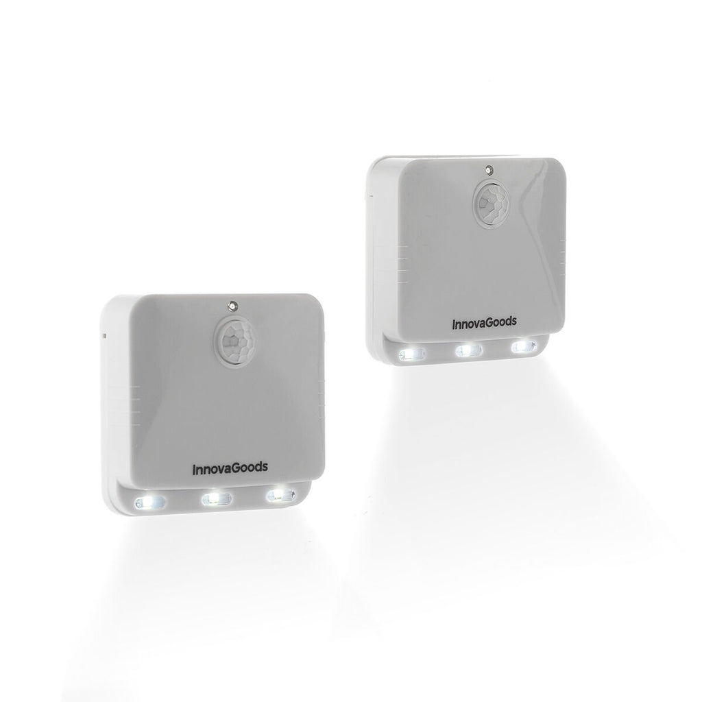 Image of two LED units with lights on, highlighting their brightness and functionality in a dark setting.