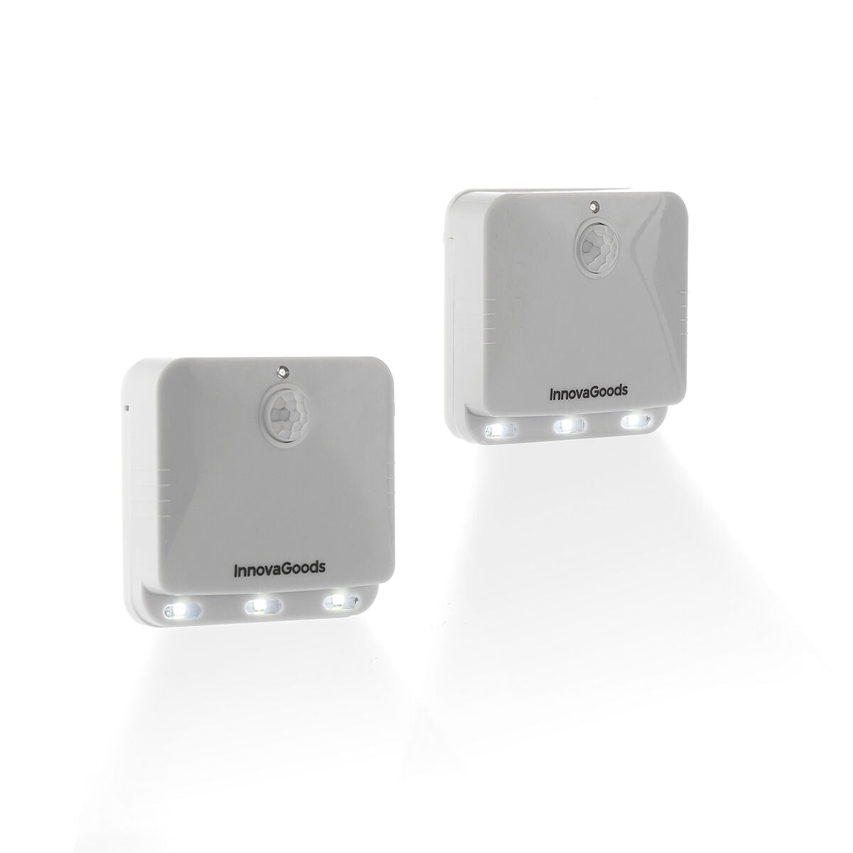 Image of two LED units with lights on, highlighting their brightness and functionality in a dark setting.