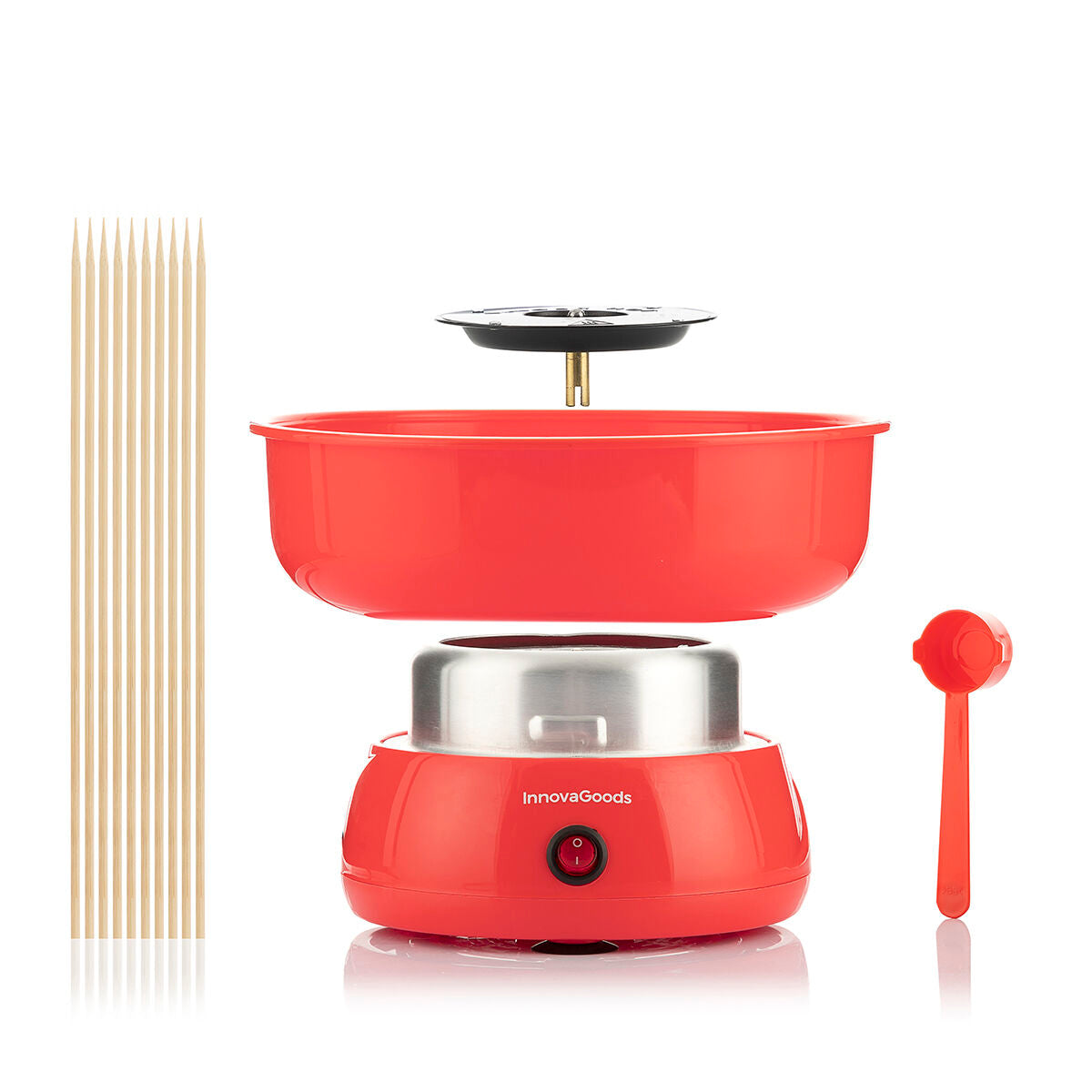 A product shot showing the components of the Candy Floss Machine Cantty InnovaGoods separately, including the red bowl, base, and accessories such as wooden sticks and a measuring spoon.