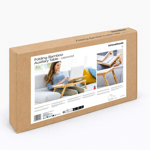 The packaging of the folding bamboo table with product images and branding. It is contained in a simple cardboard box with printed details.