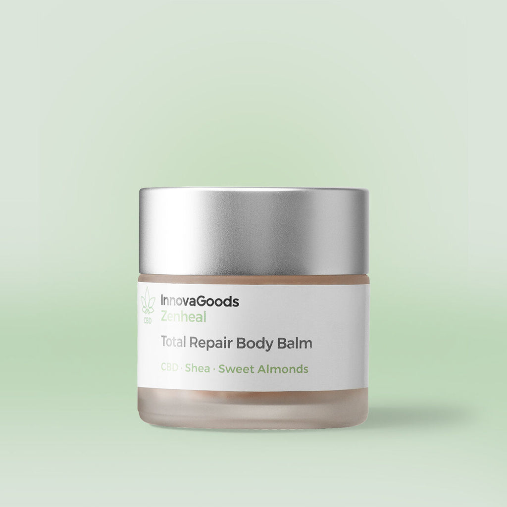 The balm is in a frosted glass jar with a matte silver lid. The label reads 'InnovaGoods Zenheal Total Repair Body Balm CBD · Shea · Sweet Almonds'. The background is a light pastel green, complementing the product's natural and soothing theme.