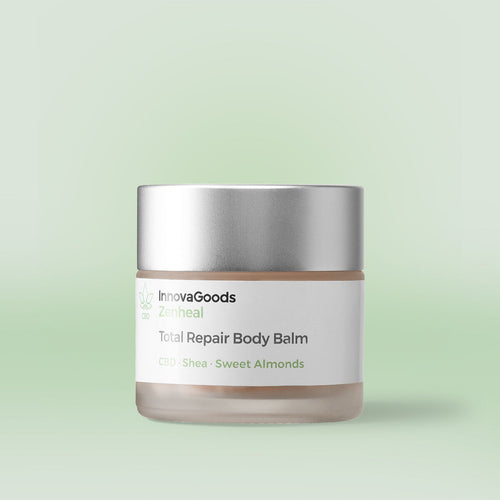 The balm is in a frosted glass jar with a matte silver lid. The label reads 'InnovaGoods Zenheal Total Repair Body Balm CBD · Shea · Sweet Almonds'. The background is a light pastel green, complementing the product's natural and soothing theme.
