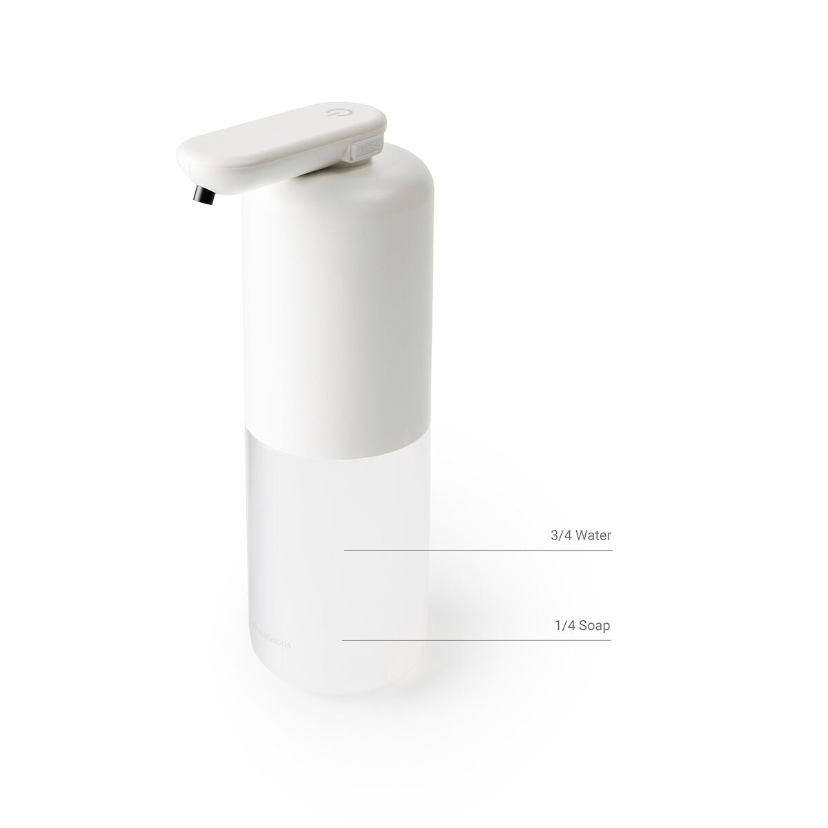 A close-up view of the dispenser, showing the measurement for filling: 3/4 water and 1/4 soap.