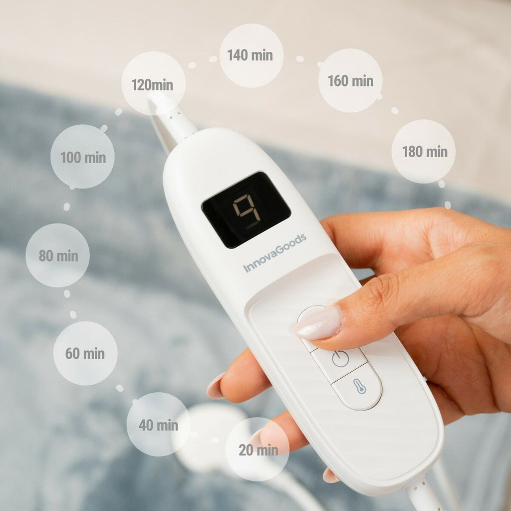 Close-up of the control unit with timer settings displayed.