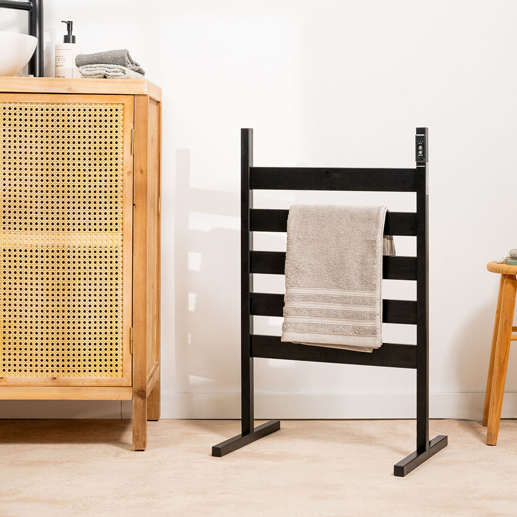 Towel rail placed in a bathroom setting, highlighting its practicality and placement options.