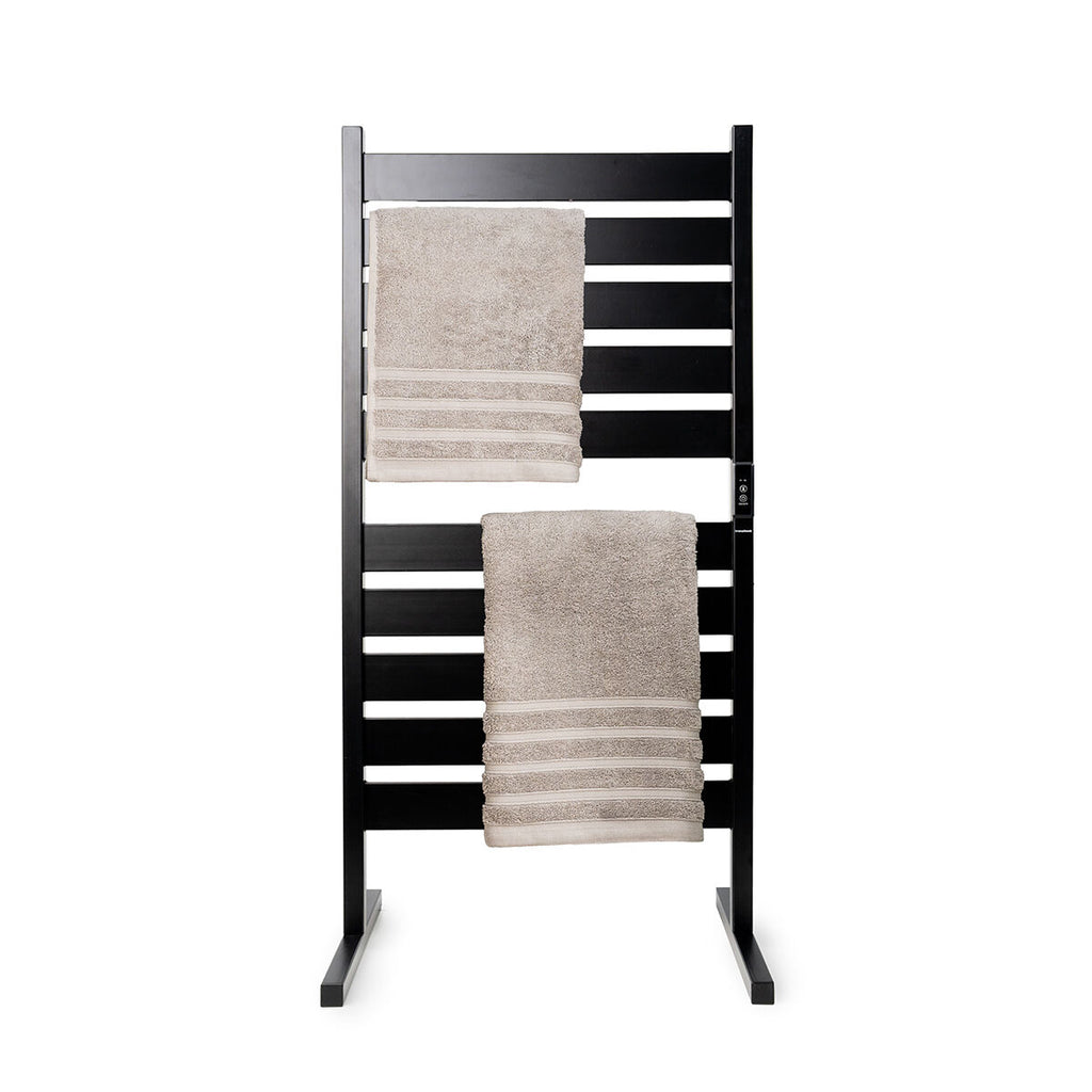The towel rail displayed with towels hanging, highlighting its practical use and sleek design.