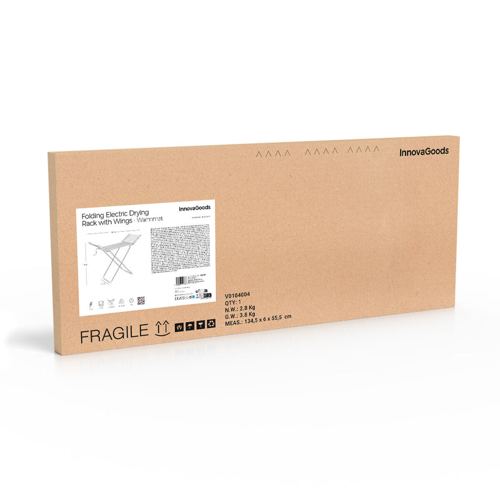 A cardboard packaging box is shown, labeled with 'Folding Electric Drying Rack With Wings - Warmmat' from InnovaGoods. It includes product specifications and a simple line drawing of the dryer.